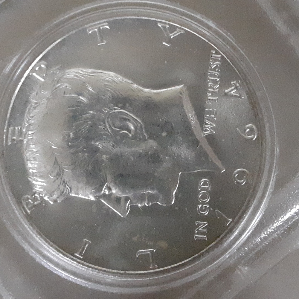 Rare All silver 1964 Kennedy half dollar